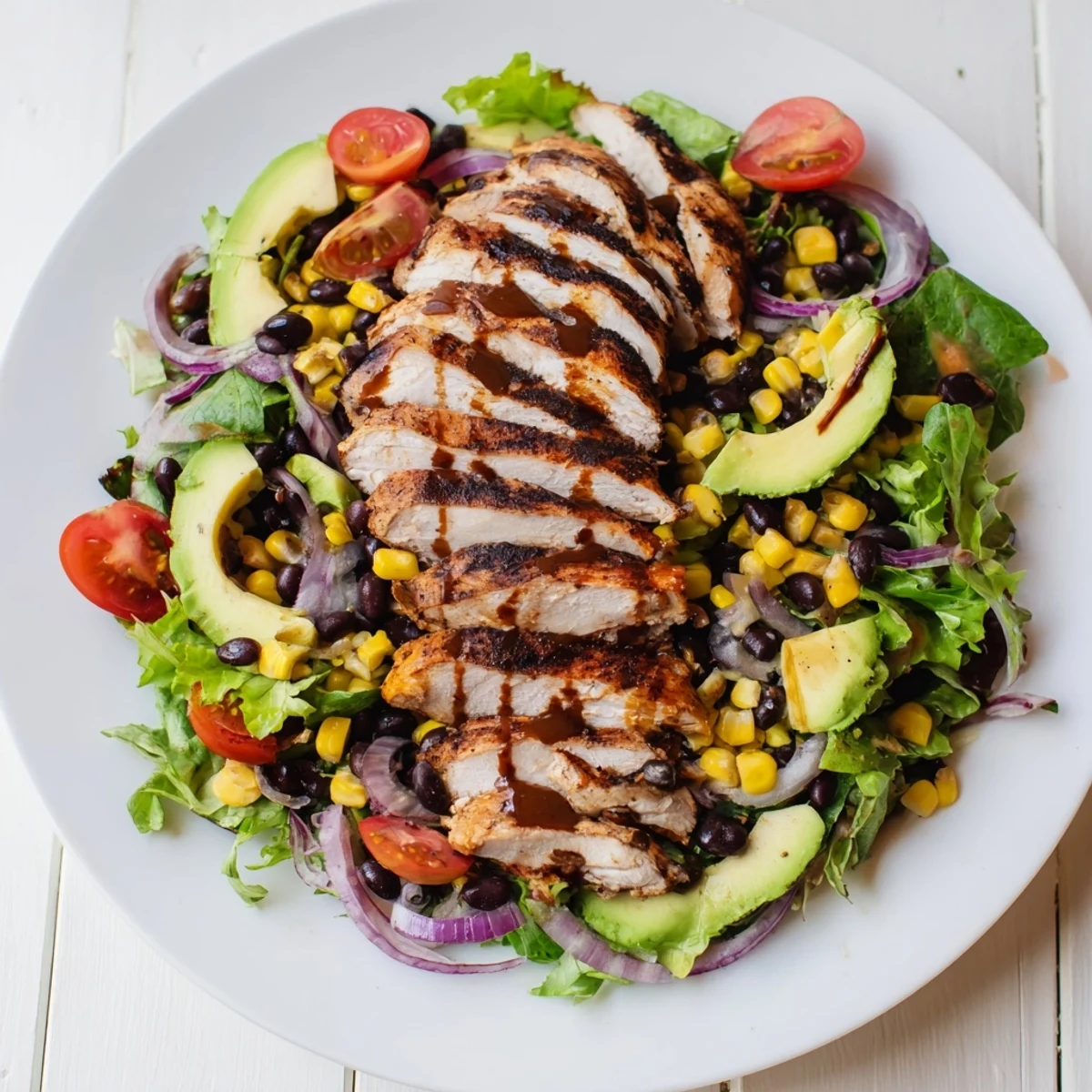 Vibrant chipotle lime chicken salad served in a rustic bowl, perfect for a refreshing gluten-free dinner.