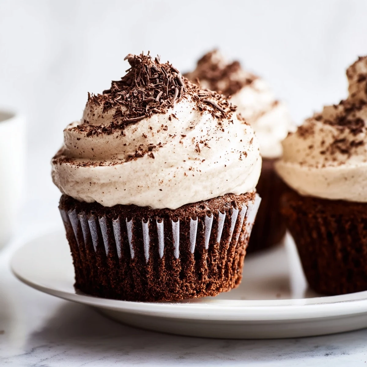 Rich chocolate cupcakes soaked in coffee syrup and topped with creamy mascarpone frosting