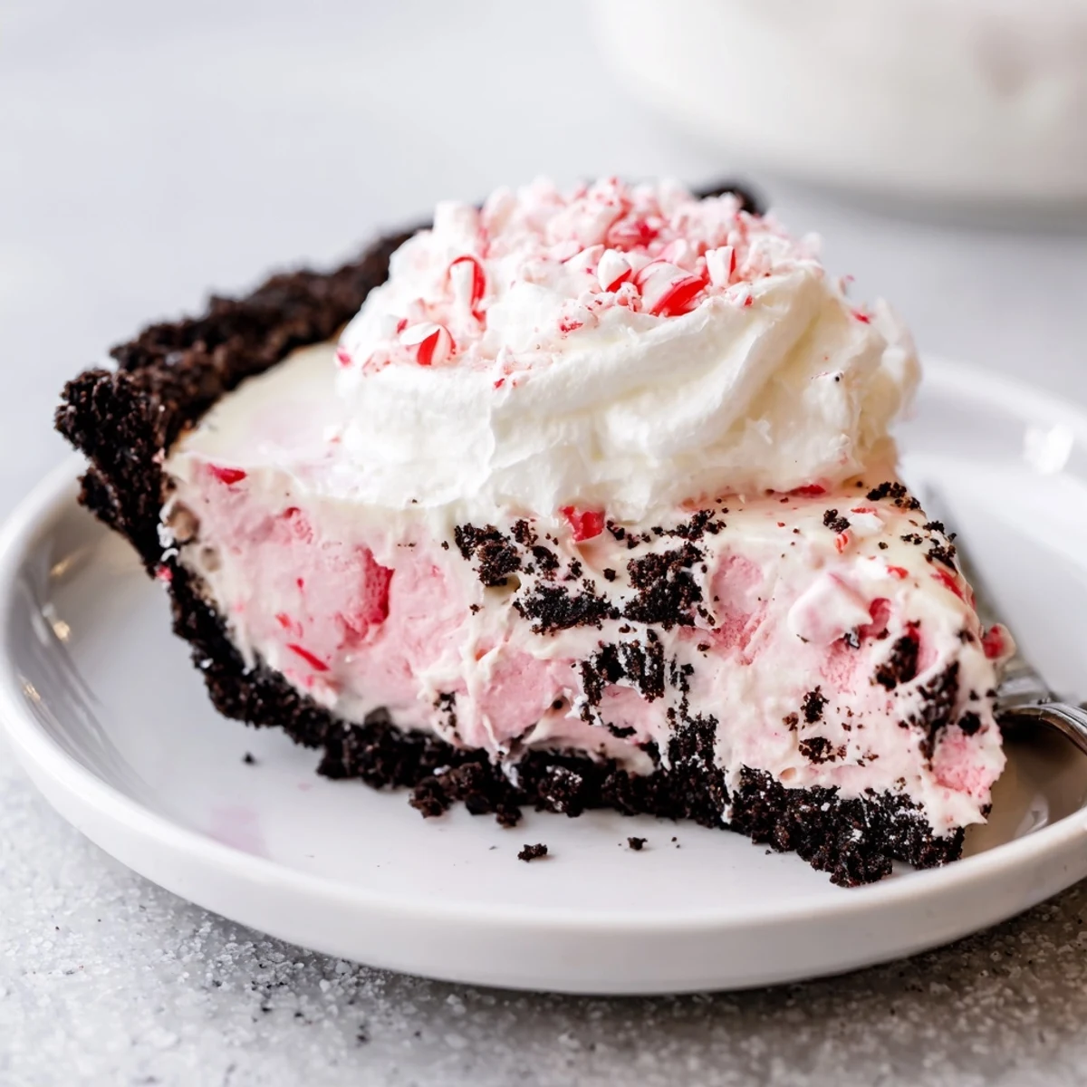 No-bake Candy Cane Pie set overnight, peppermint aroma, pillowy marshmallows visible.