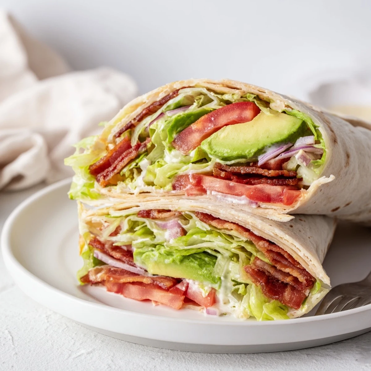 Fresh Meal Prep BLT Wraps wrapped in foil, ready for easy lunches